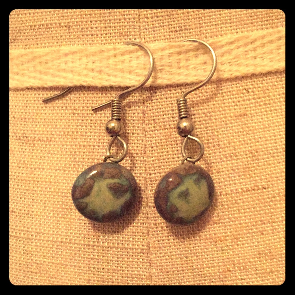 Blue stone earrings on striking silver backs
